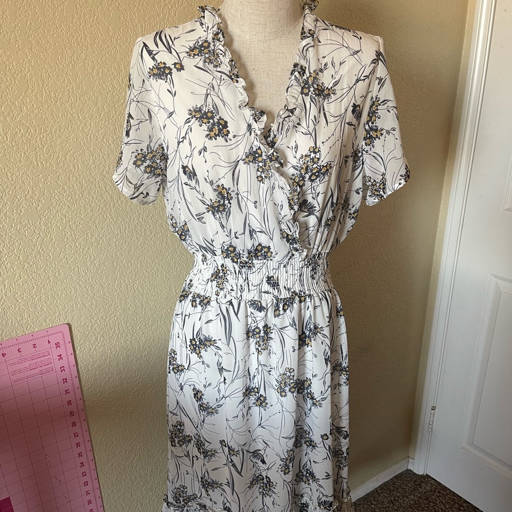 Shirred waisted dress with ruffled hem